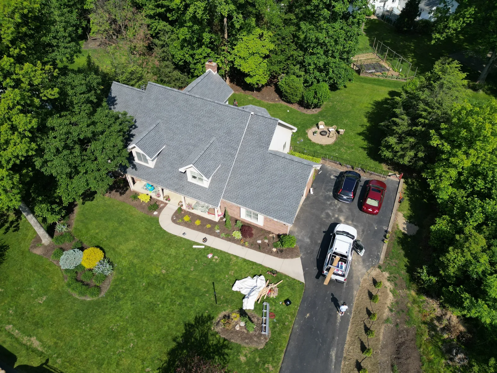 Aerial of a completed gray architectural shingle roof